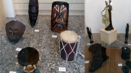 Afrikanische Deko im Schaufenster eines Oxfam Shops