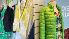  Designer Kleidung im Schaufenster des Oxfam Shop Hamburg-Hoheluft